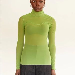 Eliza Faulkner mesh like green top
